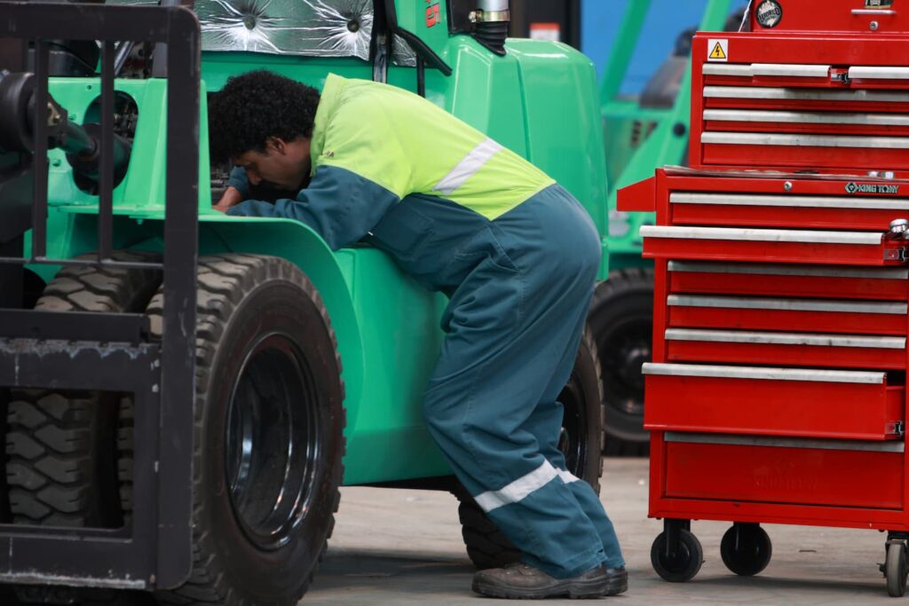 used forklift being repaired
